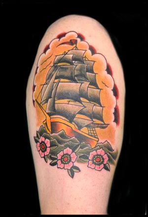 Traditional colour  ship on upper arm 