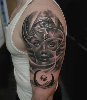 Intricate black and gray realism tattoo of an Egyptian goddess eye, expertly done by Craig Hicks.