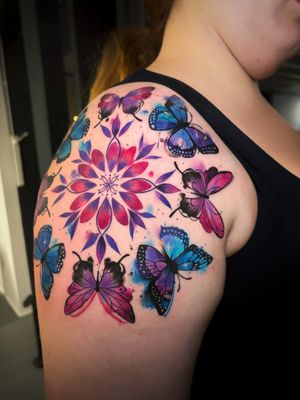 Mandala butterfly and flowers tattoo 