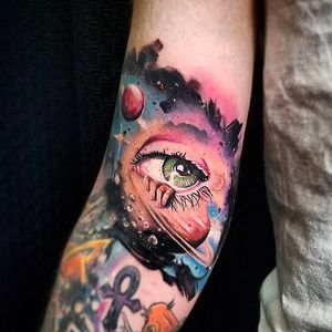 watercolor surrealism galaxy eye tattoo