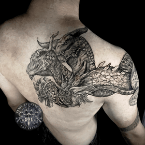 Embrace the power of the triple threat. 🐉🔥 Unleash the ferocity, wisdom, and majesty of the three-headed dragon with this breathtaking tattoo masterpiece. #TripleThreat #DragonTattoo