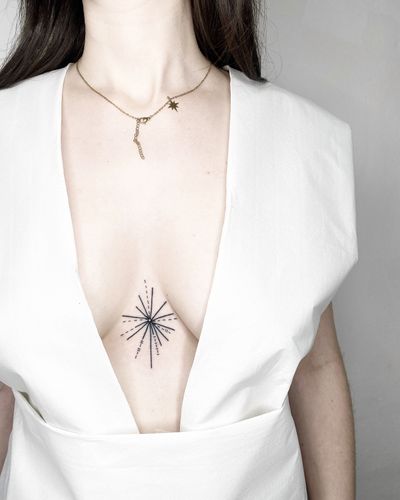 Experience the perfect harmony of geometry and celestial beauty with this stunning star motif tattoo by renowned artist Malvina Maria Wisniewska.