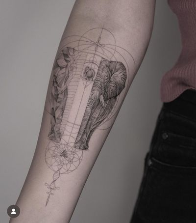 Unique black and gray fine line tattoo of an elephant intertwined with DNA. By artist Kayla.