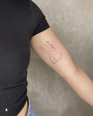 Get a sexy and stylish fine line illustration of a woman's bum by the talented artist Amelia. Perfect for those who want a unique and bold tattoo design.