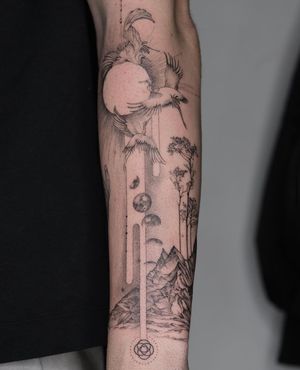 Experience the serene beauty of a black and gray tattoo featuring a majestic crane, phases of the moon, and a scenic mountain landscape, expertly crafted by Kayla.