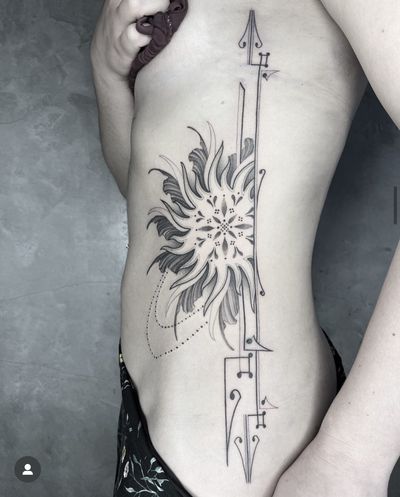 Elegant and intricate geometric design featuring a beautiful flower and arrow, crafted by the talented artist Kayla.
