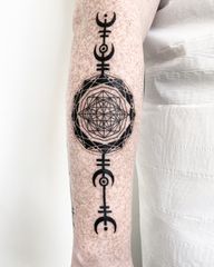 Explore the intricate patterns and abstract designs of Malvina Maria Wisniewska's blackwork masterpiece.