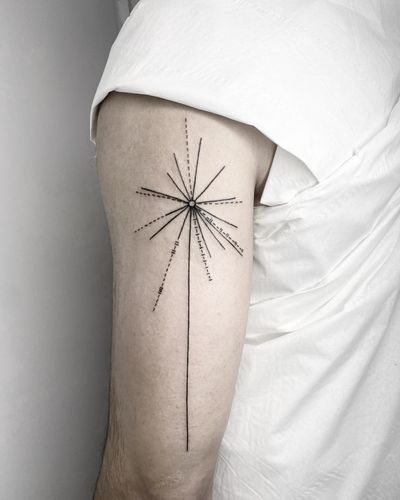 Experience the artistry of Malvina Maria Wisniewska with this fine line, geometric tattoo featuring a stunning star motif intertwined with intricate lines.