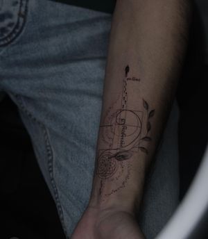 Experience the beauty of fibonacci sequence in this fine line geometric tattoo by Kayla, showcasing the golden ratio.