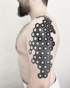Intricate pattern of hexagons in bold blackwork style, crafted by talented artist, Malvina Maria Wisniewska.