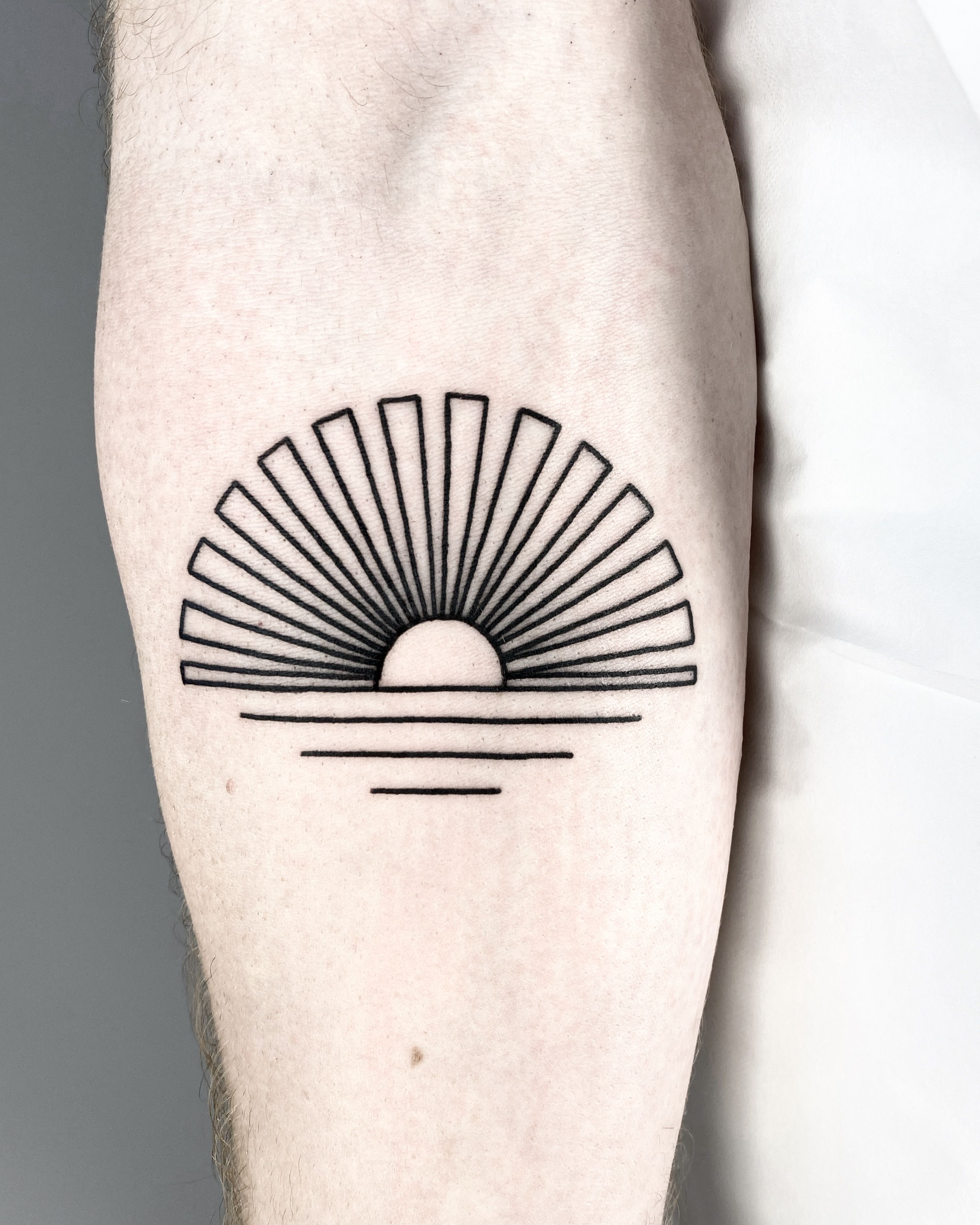 Geometric sunrise valley tattoo, Hannahiimartin | Sunset tattoos, Time  tattoos, Geometric tattoos men