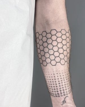 Explore the intricate beauty of this fine line geometric pattern tattoo, meticulously crafted by the talented artist Malvina Maria Wisniewska.