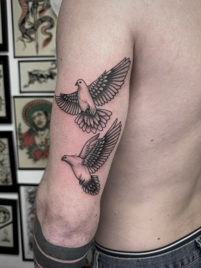 Get a stunning illustration of a dove by talented artist Ryan Goodrum for a timeless and symbolic tattoo.