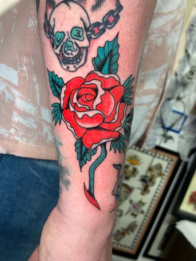 Elegant and timeless rose design executed with precision by renowned tattoo artist Ryan Goodrum.