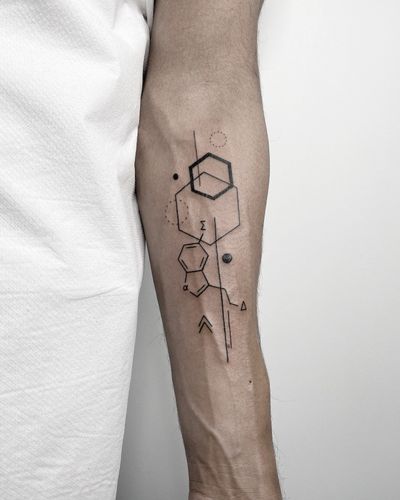 Explore the beauty of chemistry with this captivating blackwork tattoo by Malvina Maria Wisniewska. A perfect fusion of science and art.