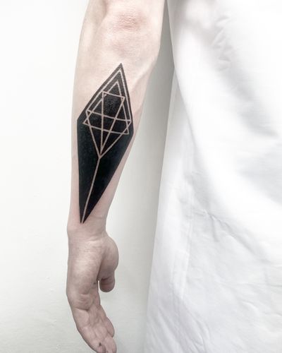 Explore the intricate world of blackwork with this geometric pattern tattoo by Malvina Maria Wisniewska