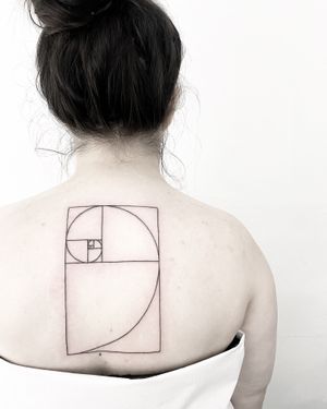 Fine line geometric tattoo by Malvina Maria Wisniewska, inspired by the mathematical beauty of the golden ratio and Fibonacci spiral.
