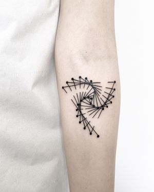Explore the mesmerizing world of abstract fractals with this stunning blackwork tattoo by Malvina Maria Wisniewska.
