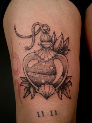 Get a unique illustrative tattoo of a potion bottle by the talented artist Kat Jennings. Stand out from the crowd with this mystical design.