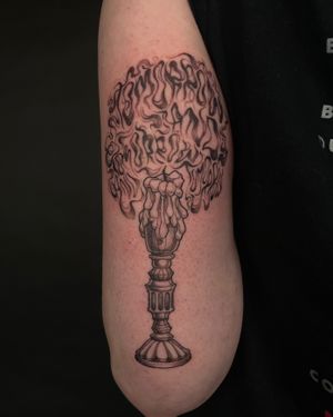Get a stunning illustrative tattoo of a candle and candlestick holder referencing ‘tomorrow, tomorrow, tomorrow’ from Macbeth by the talented artist Kat Jennings. Unique and elegant design.