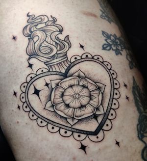 Beautiful dotwork tattoo by Mary Shalla featuring a unique blend of tudor rose and sacred heart motifs.