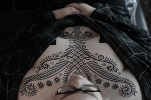 Exquisite blackwork ornamental pattern tattoo by Francesco Capro, featuring stunning detailed design elements.