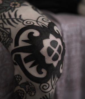 Stunning blackwork ornamental tattoo by Francesco Capro, featuring intricate and detailed designs.
