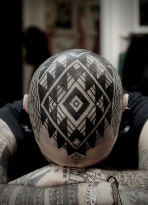 A stunning ornamental tattoo by Francesco Capro, featuring intricate blackwork patterns. Perfect for those who appreciate detailed artwork.