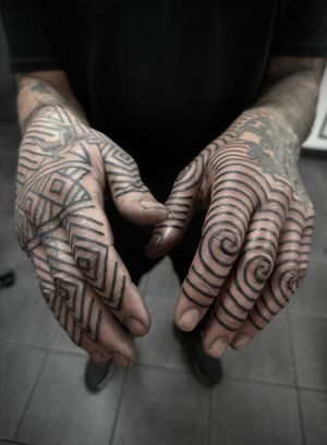Unique blackwork tattoo by Francesco Capro featuring a mesmerizing ornamental pattern design.