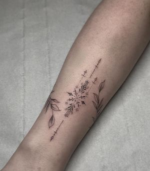 Discover the beauty of delicate ornamental tattoos with this stunning piece by tattoo artist Maddie. Perfect for those who appreciate intricate details and fine craftsmanship.