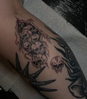 Get a striking illustrative skull tattoo by the talented artist Julia Bertholdi. A unique design to showcase your bold personality.