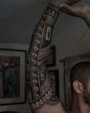 Get a unique tribal-inspired pattern tattoo by renowned artist Francesco Capro. Perfect for those who appreciate ornamental blackwork designs.