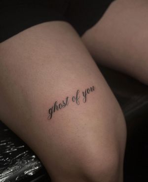 Get a chic and subtle small lettering tattoo by the talented artist Maddie for a timeless and personal touch.