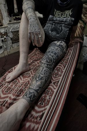 Experience the mastery of Francesco Capro in this ornamental tattoo design combining blackwork and tribal styles.