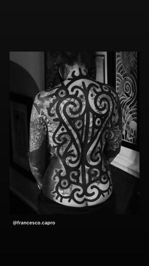 Discover the beauty of this blackwork ornamental tattoo with stunning patterns, expertly done by Francesco Capro.