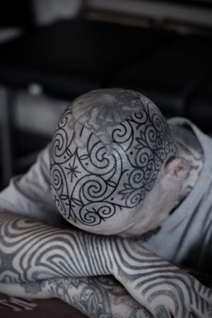 Discover the mesmerizing artistry of an ornamental pattern tattoo by Francesco Capro. Embrace the timeless beauty of ornamental design.