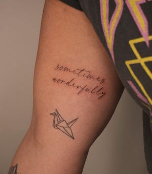 Small lettering tattoo style