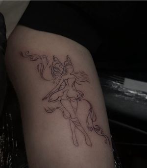 Experience the magical world with this fine line, illustrative fairy tattoo done by the talented artist Maddie. Let your inner fairy shine!