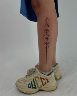 Small lettering tattoo by Faith Llewellyn, perfect for those seeking minimalist ink.