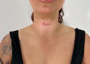 Get a delicate tattoo with small lettering by artist Faith Llewellyn for a unique and sophisticated look.