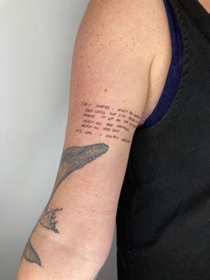 Express your personal style with this fine line tattoo by Gee, featuring small lettering for a subtle yet sophisticated touch.