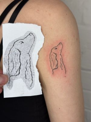 Get an elegant and detailed dog tattoo by the talented artist Gee, featuring fine line work and illustrative style.