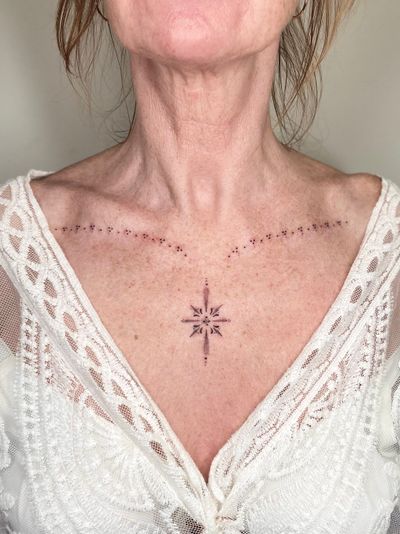 Get a beautiful and intricate dotwork ornamental tattoo by the talented artist Viví Bogdanov. Embrace the delicate beauty of this unique design.