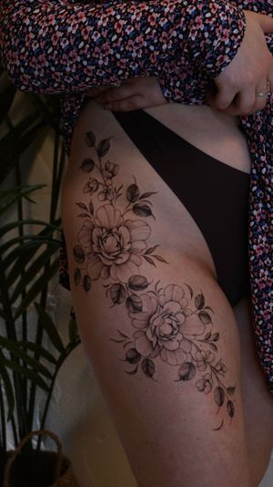 Floral hip piece with peonies and sweet pea flowers 