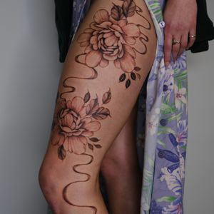 Part of a full leg sleeve, fineline peonies and abstract flow lines