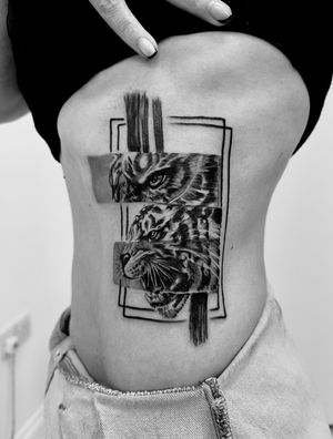 An illustrative tattoo by Gabriele Lacerenza featuring a fierce tiger within an abstract frame design.