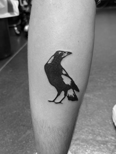 Detailed crow tattoo showcasing Gabriele Lacerenza's illustrative style in bold blackwork.