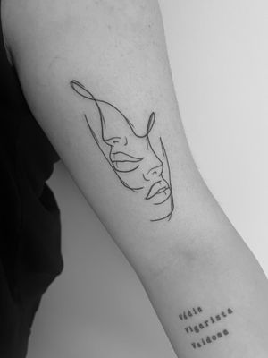 Get a stunning illustrative tattoo of a face using a singleline technique by the talented artist Gabriele Lacerenza.