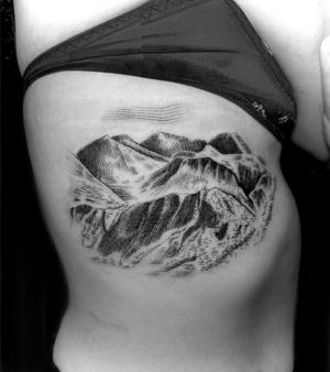 Capture the beauty of nature with this illustrative tattoo by Gabriele Lacerenza. Featuring a scenic mountain landscape.