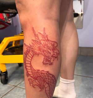 A Red Dragon customized to wrap around the leg. Took 4 hours